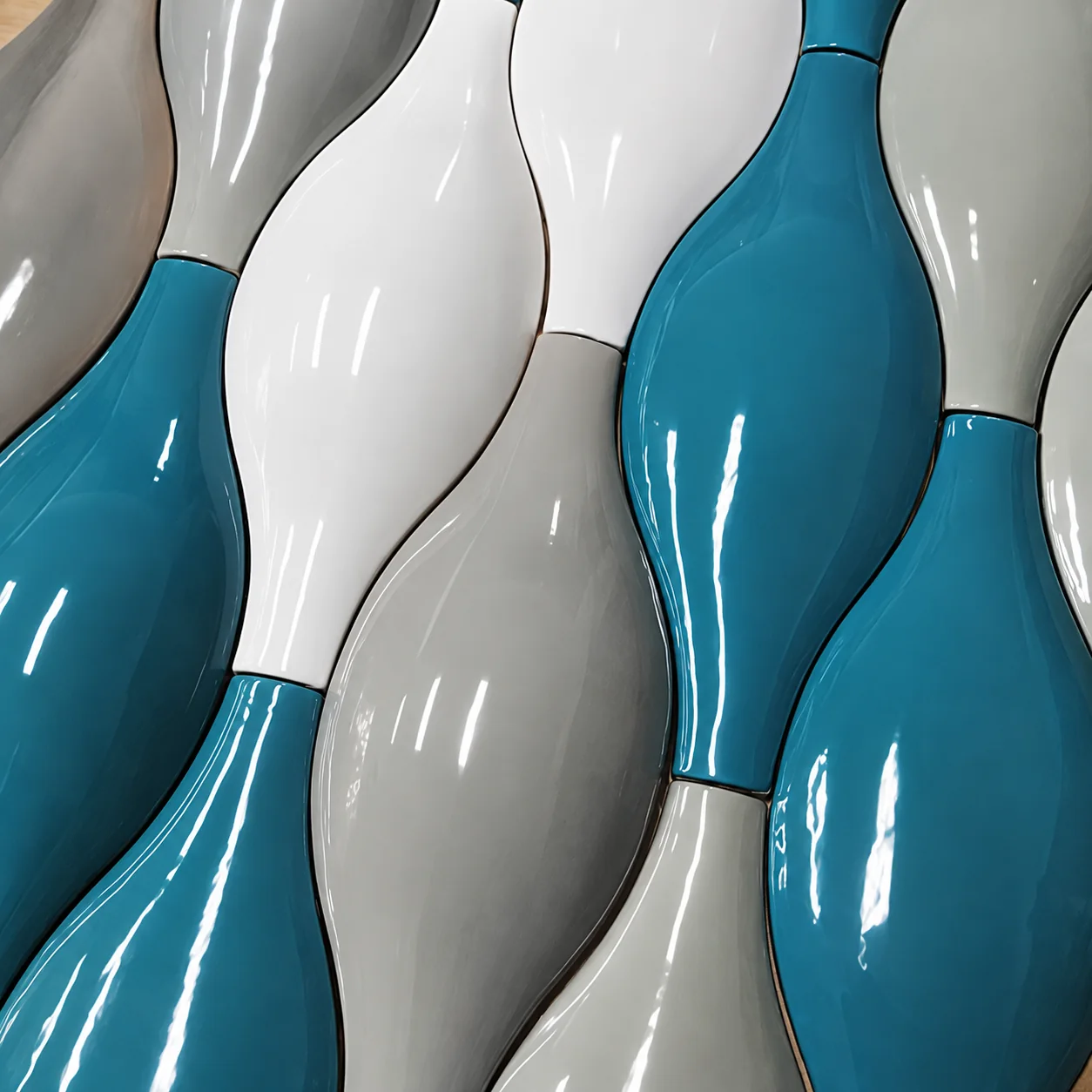 Blue and white sculptural ceramic tiles